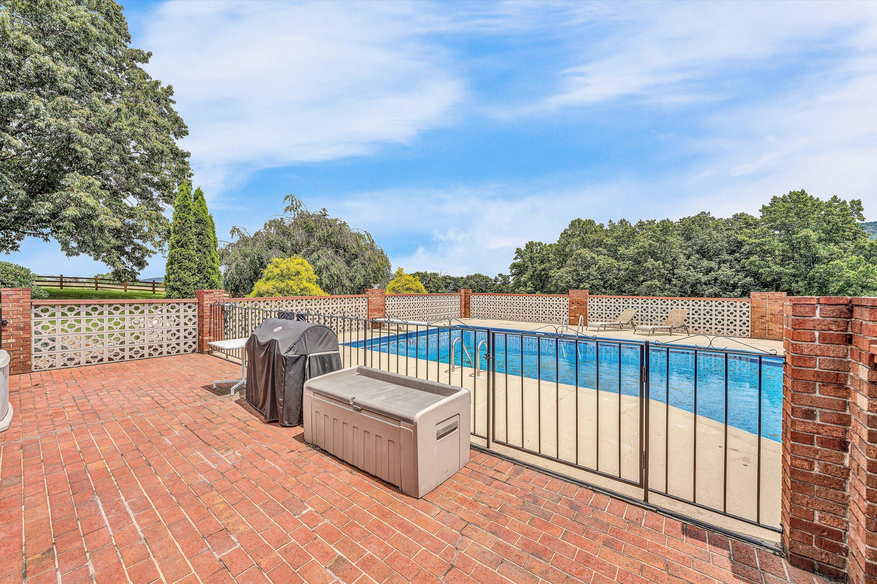 270 Parkside Lane Rocky Mount, VA 24151 - Photo 43 of 55 a view of a chairs and tables on the roof deck
