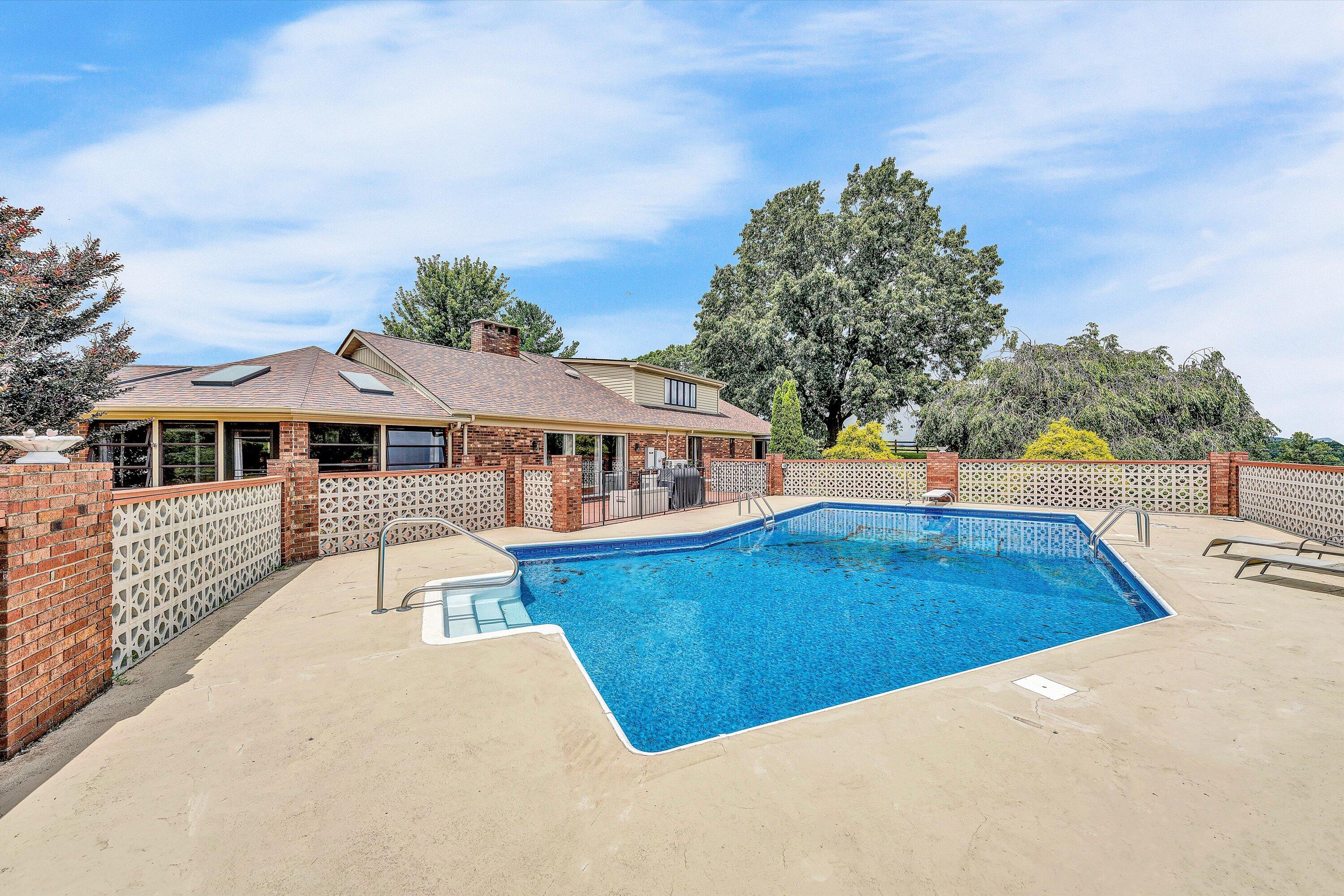 270 Parkside Lane Rocky Mount, VA 24151 - Photo 46 of 55 a view of a house with pool and a yard