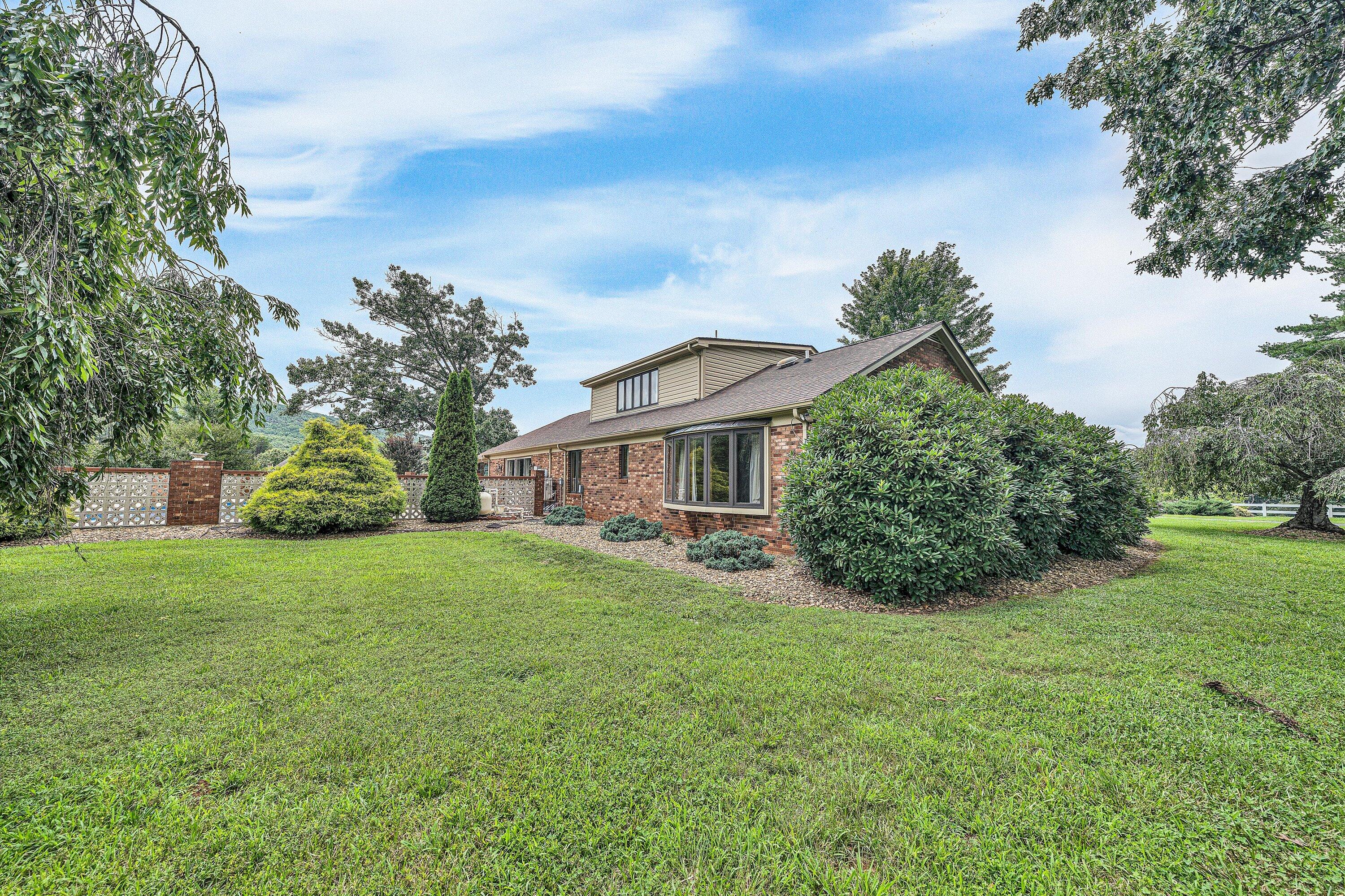270 Parkside Lane Rocky Mount, VA 24151 - Photo 49 of 55 a front view of a house with a garden