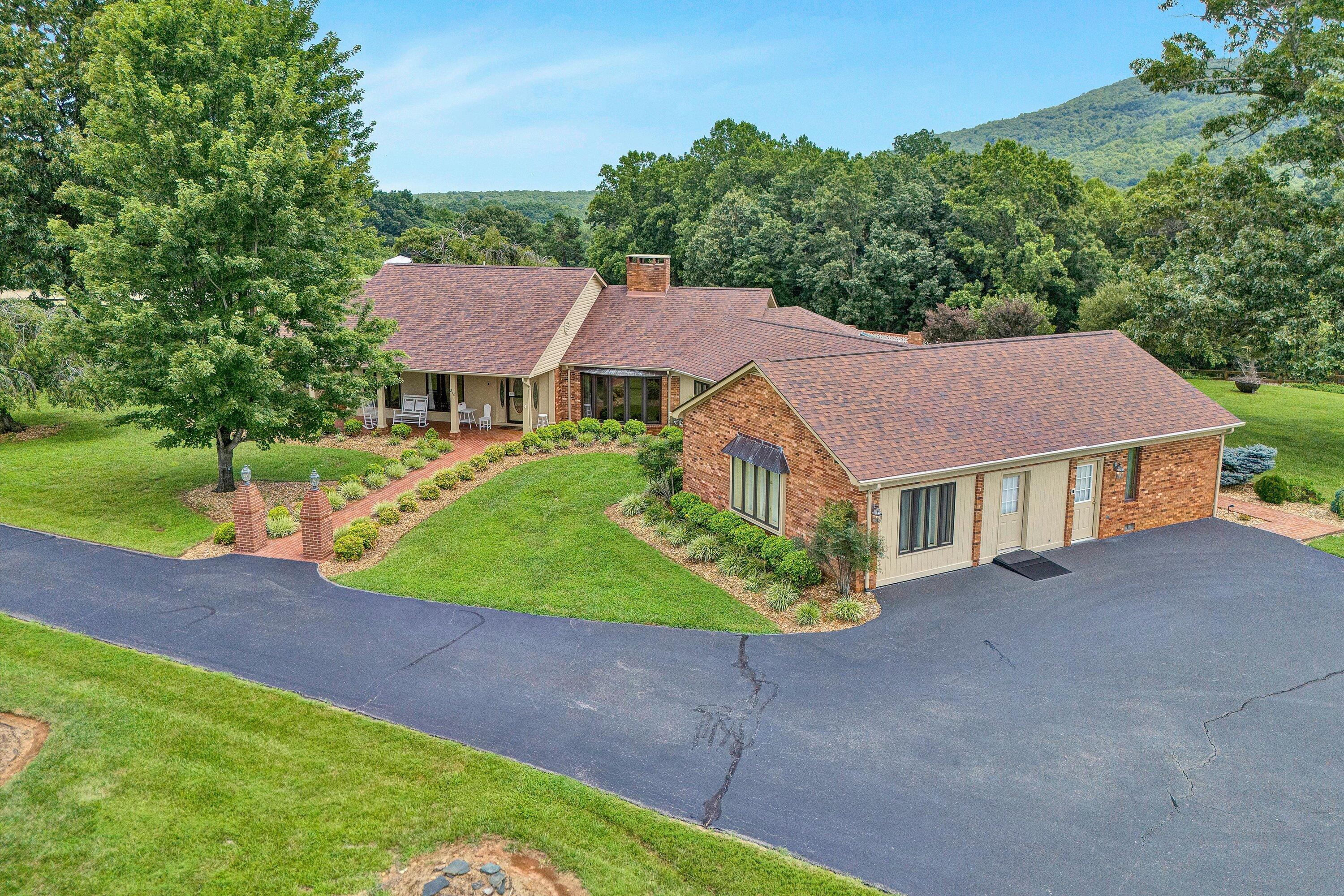 270 Parkside Lane Rocky Mount, VA 24151 - Photo 51 of 55 a view of a house with a yard and tree s