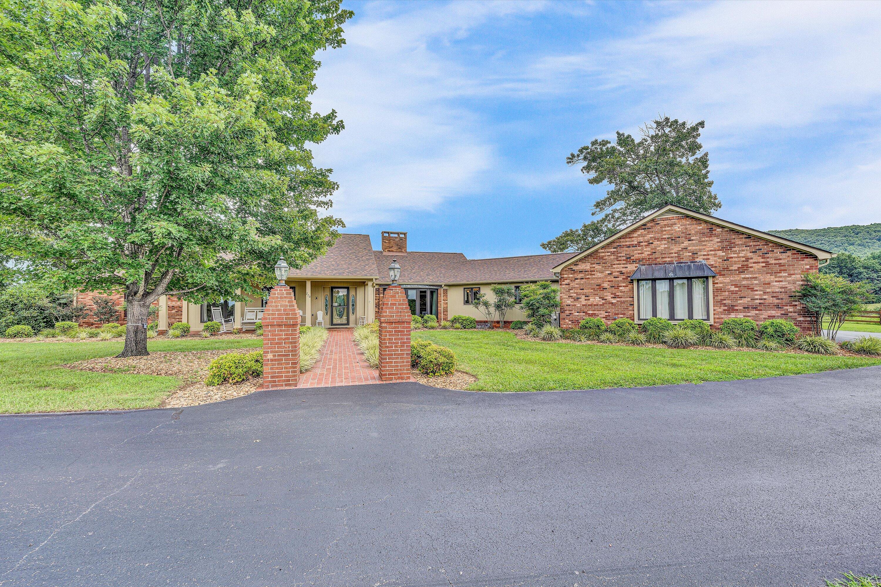 270 Parkside Lane Rocky Mount, VA 24151 - Photo 54 of 55 a front view of a house with garden