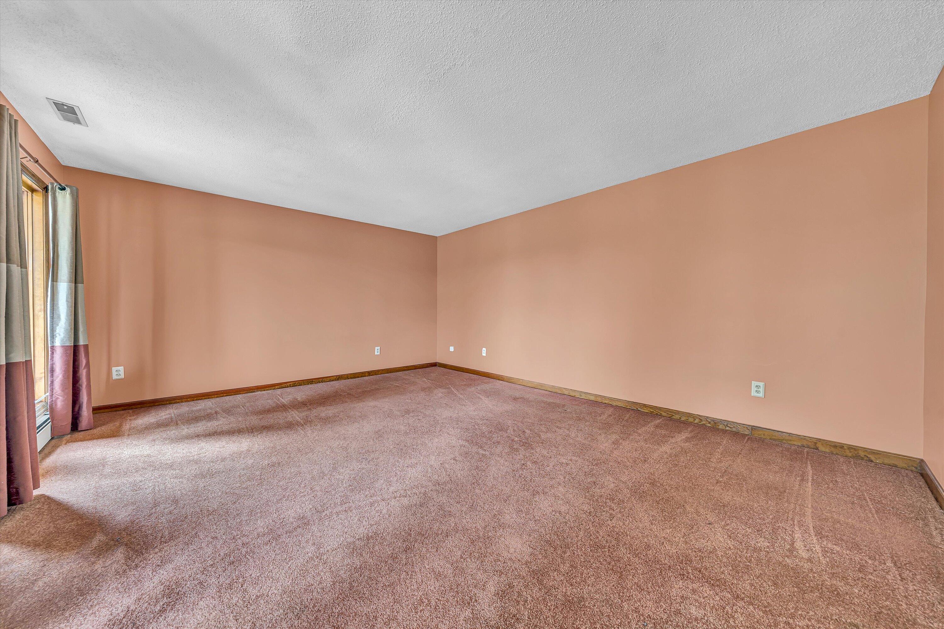 270 Parkside Lane Rocky Mount, VA 24151 - Photo 8 of 55 an empty room with a empty space and windows