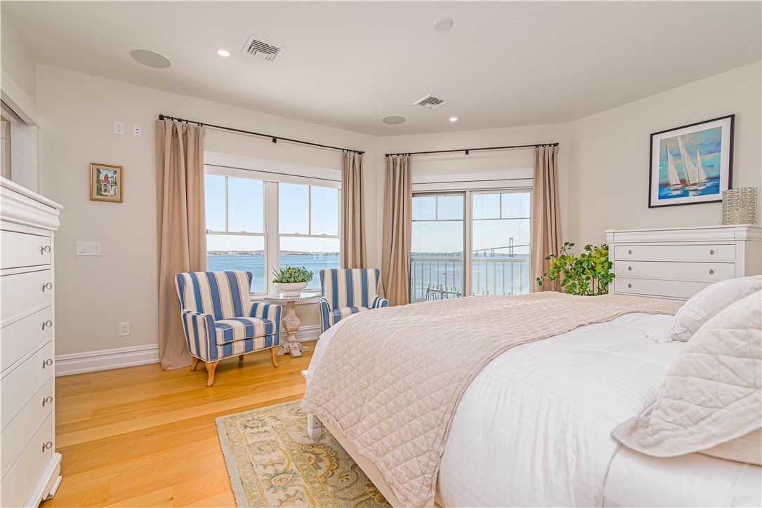 10 Coulter Street Jamestown, RI 02835 - Photo 21 of 48 Primary bedroom with Juliette balcony overlooking the bay & bridge.