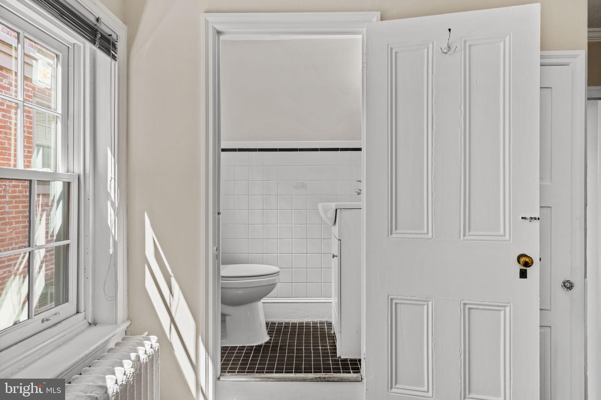 2208 Rittenhouse Square Philadelphia, PA 19103 - Photo 23 of 27 a bathroom with a toilet and a shower