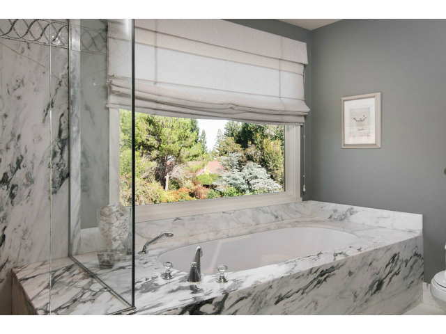 361 Ridgeway Road Woodside, CA 94062 - Photo 12 of 21 a bathroom with a granite countertop sink and a window
