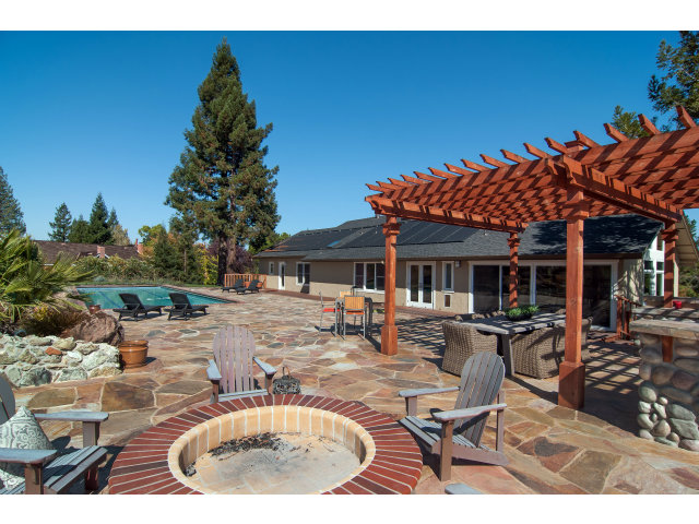 361 Ridgeway Road Woodside, CA 94062 - Photo 17 of 21 a view of a house with backyard porch and sitting area