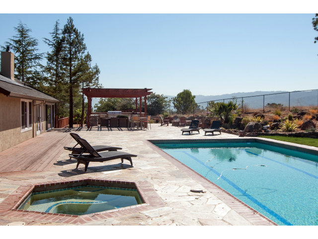 361 Ridgeway Road Woodside, CA 94062 - Photo 18 of 21 a view of swimming pool with outdoor seating
