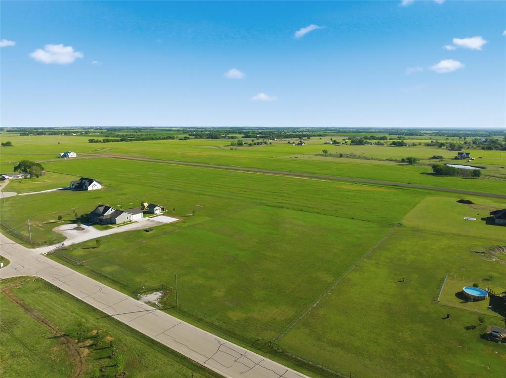 182 Grassy Way Elm Mott, TX 76640 - Photo 4 of 12 a view of a field with an ocean
