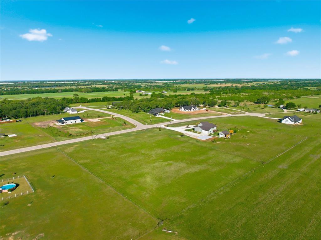 182 Grassy Way Elm Mott, TX 76640 - Photo 8 of 12 a view of an outdoor space and tennis court