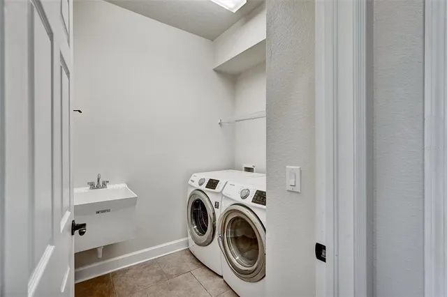 a utility room with dryer and washer