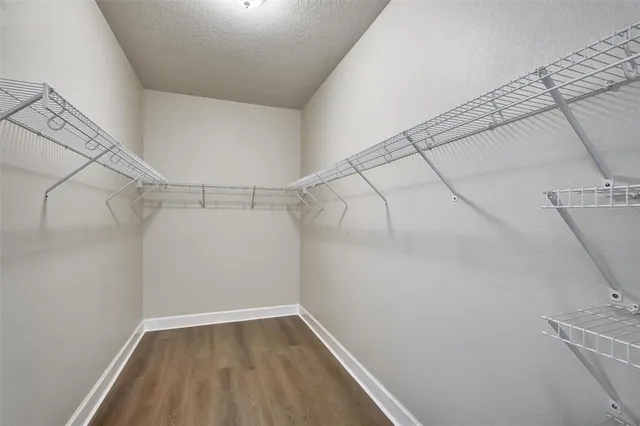 a view of a room with racks on the wall