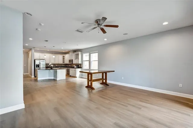 a view of kitchen and kitchen with sink