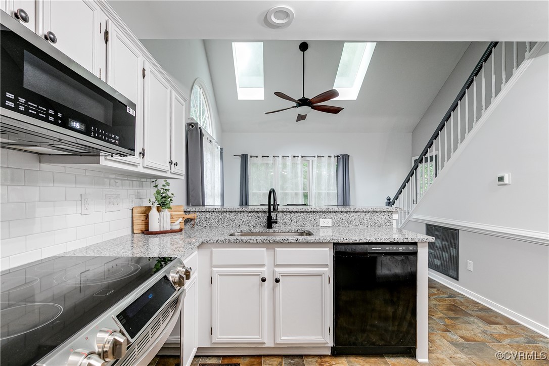 5809 Rosebay Forest Road Midlothian, VA 23112 - Photo 17 of 48 a kitchen with a sink appliances and cabinets