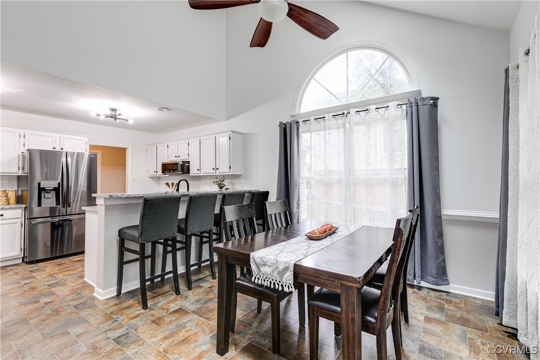 5809 Rosebay Forest Road Midlothian, VA 23112 - Photo 19 of 48 a view of a dining room with furniture