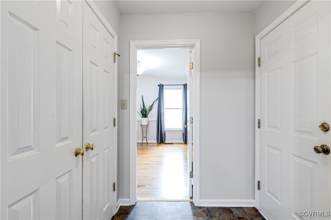 5809 Rosebay Forest Road Midlothian, VA 23112 - Photo 22 of 48 a view of a hallway with wooden floor and closet area