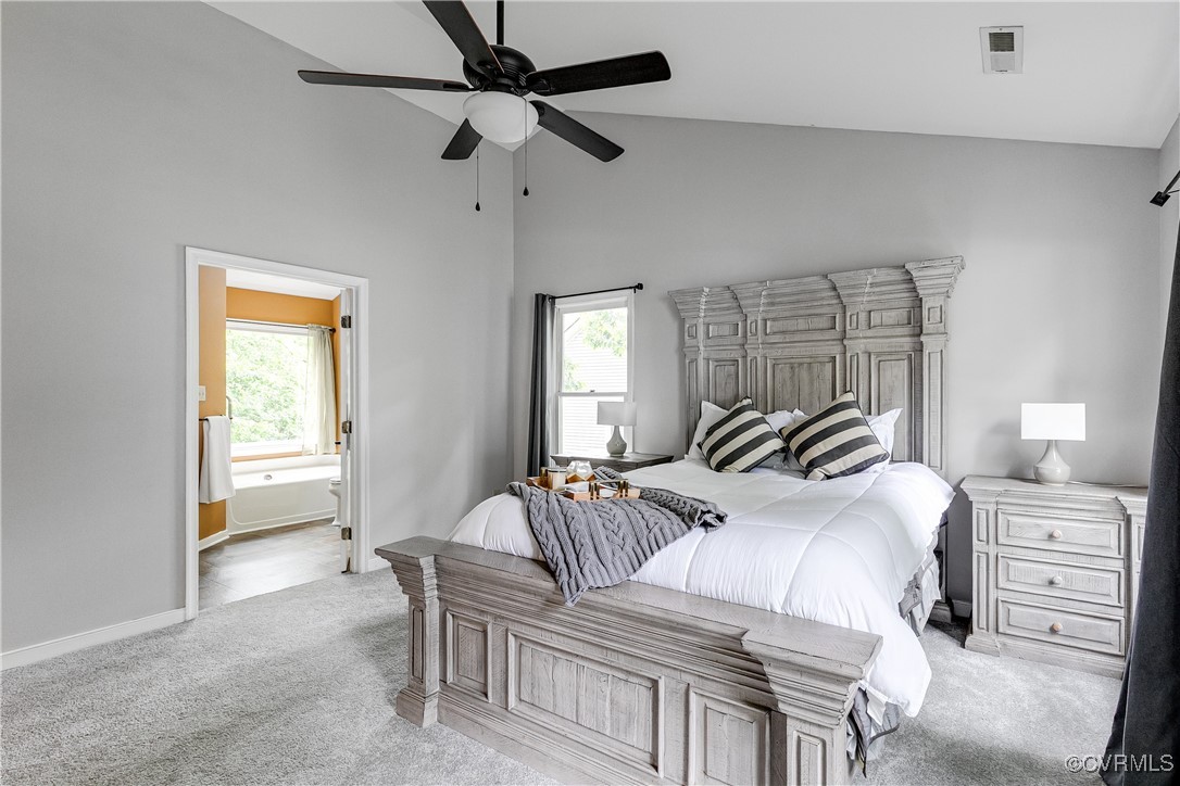 5809 Rosebay Forest Road Midlothian, VA 23112 - Photo 27 of 48 a bedroom with a bed and a chandelier