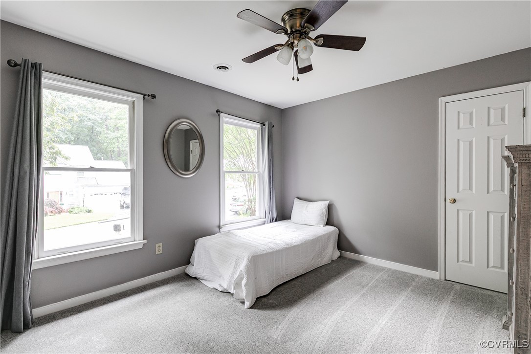 5809 Rosebay Forest Road Midlothian, VA 23112 - Photo 34 of 48 a bedroom with a bed and a window