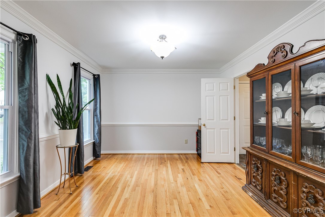 5809 Rosebay Forest Road Midlothian, VA 23112 - Photo 7 of 48 a view of a hallway with wooden floor and staircase