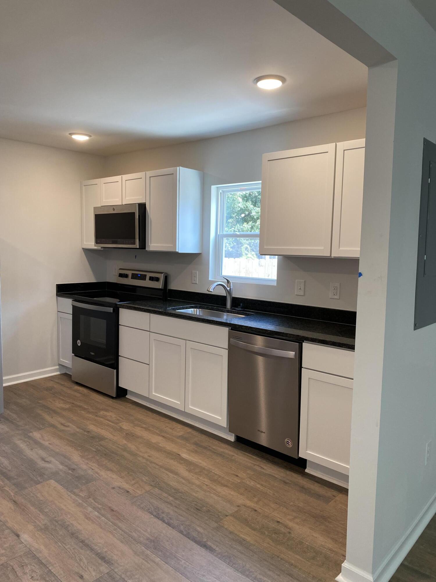 5806 Sledge Street, Unit A Hanahan, SC 29410 - Photo 6 of 22 IMG_2531