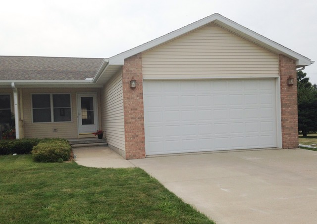 212 Finley Circle Grand Ridge, IL 61325 - Photo 1 of 11 a view of backyard with a garden and plants