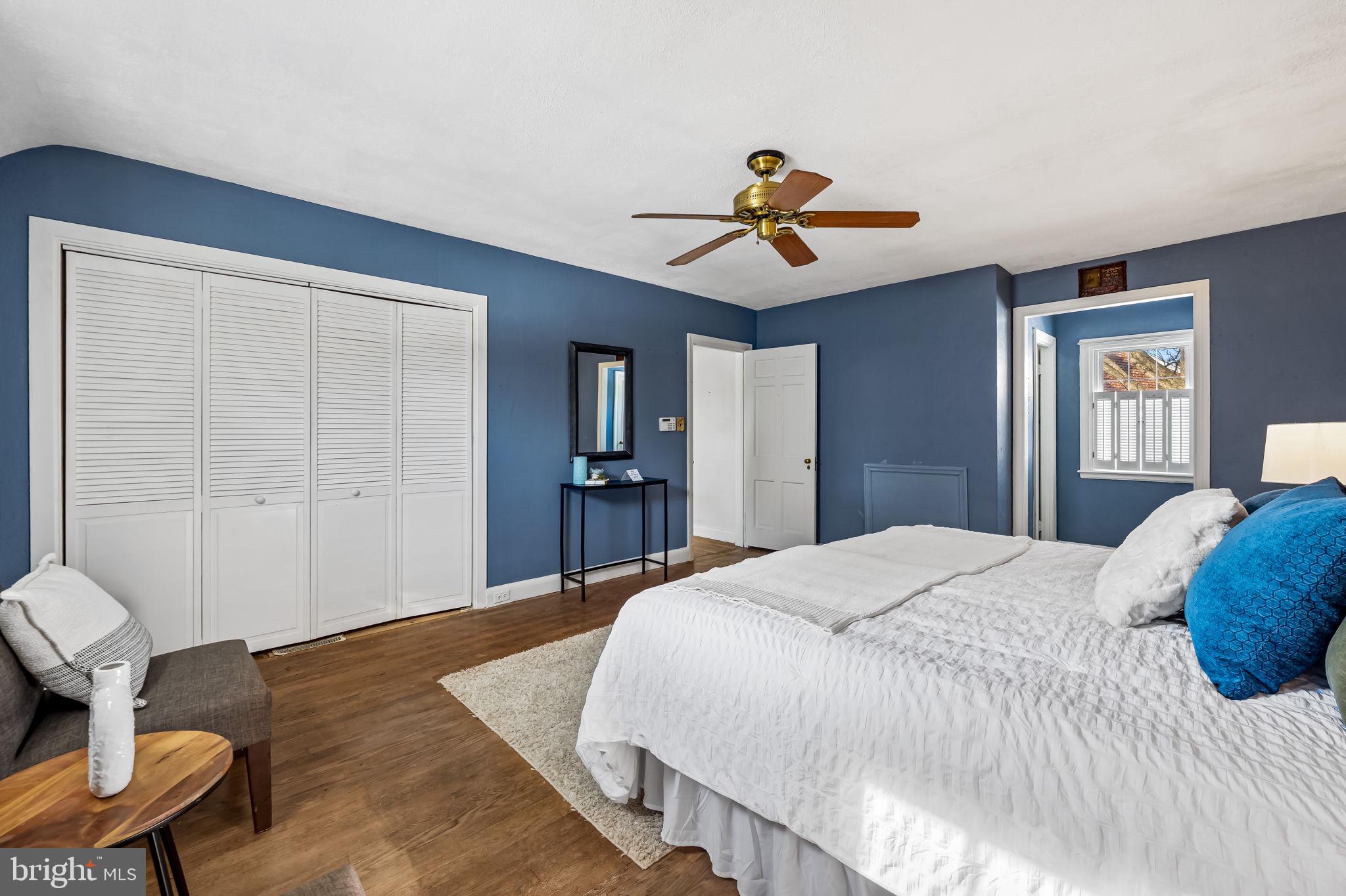3022 Dunglow Road Baltimore, MD 21222 - Photo 23 of 45 a bedroom with a bed and a chair