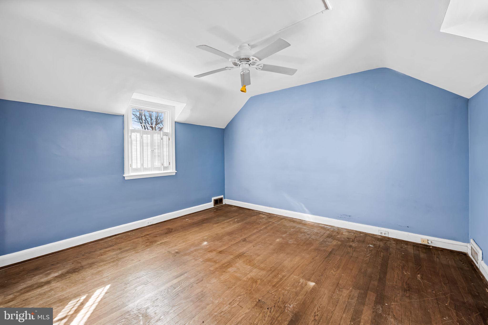 3022 Dunglow Road Baltimore, MD 21222 - Photo 29 of 45 an empty room with windows and fan