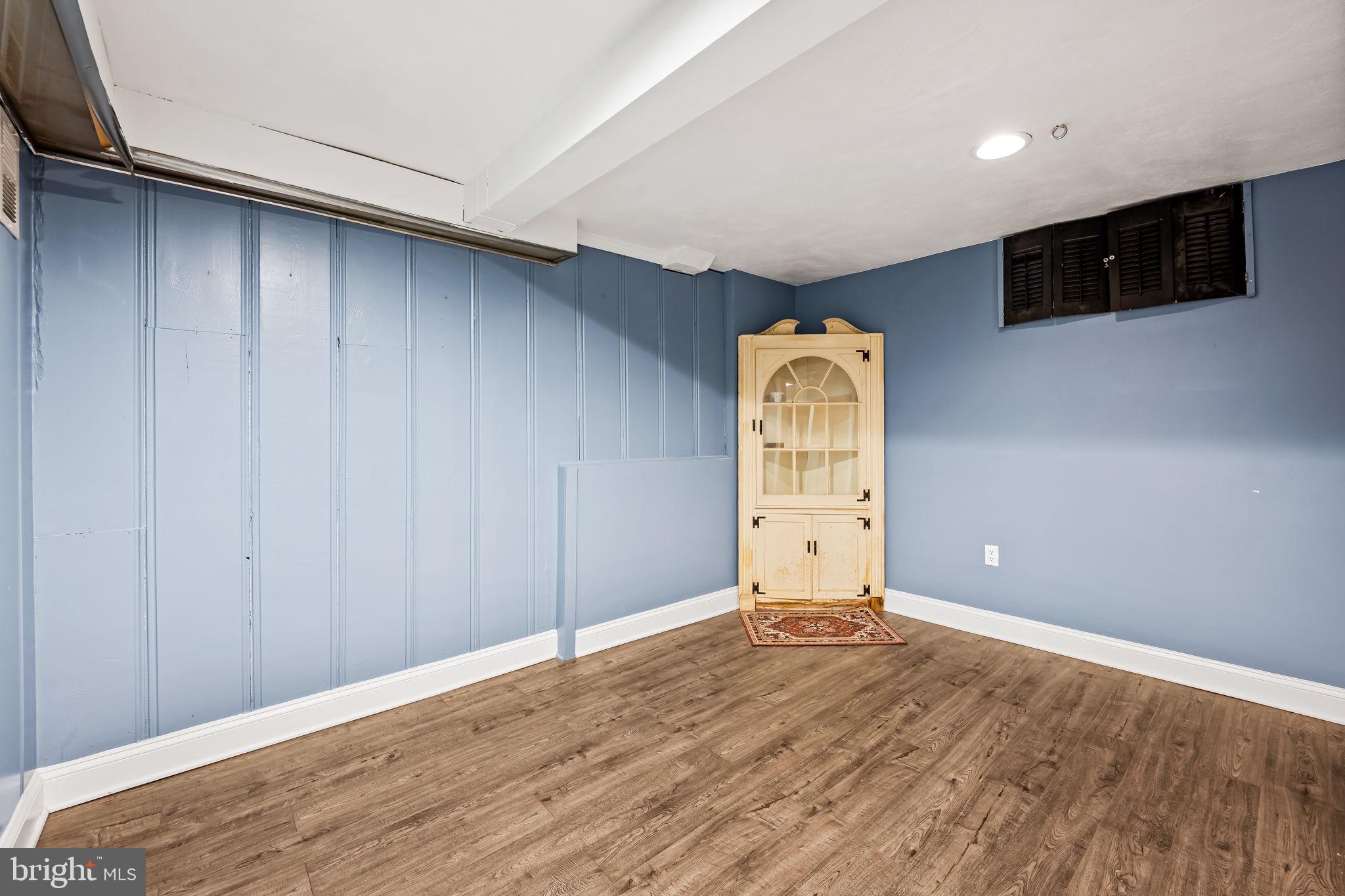 3022 Dunglow Road Baltimore, MD 21222 - Photo 38 of 45 a view of empty room with wooden floor