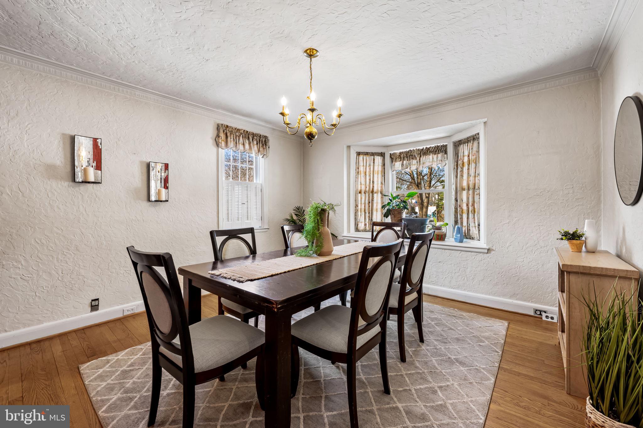 3022 Dunglow Road Baltimore, MD 21222 - Photo 8 of 45 a view of a dining room with furniture window and wooden floor