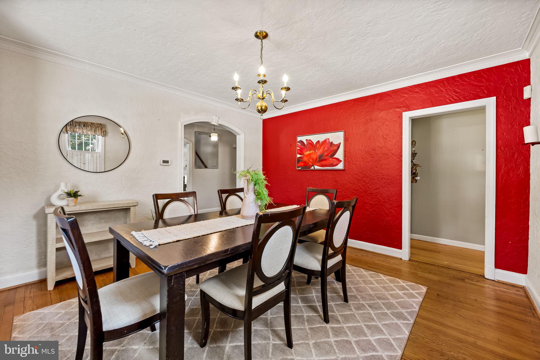 3022 Dunglow Road Baltimore, MD 21222 - Photo 9 of 45 a view of a dining room with furniture and wooden floor