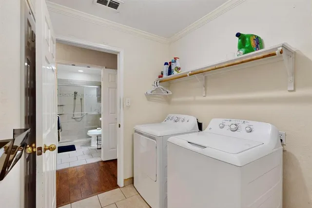 a utility room with dryer and washer
