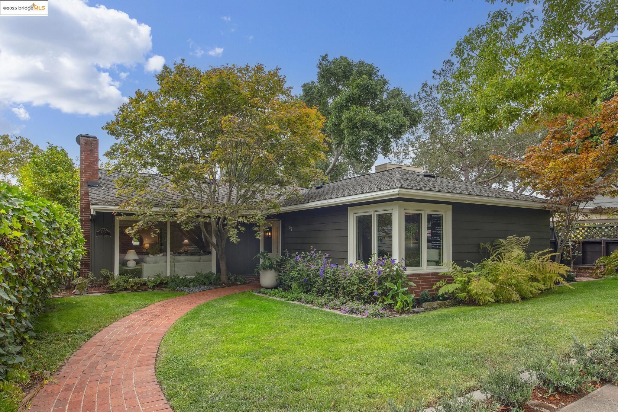 306 Ramona Avenue Piedmont, CA 94611 - Photo 1 of 1 a front view of a house with garden