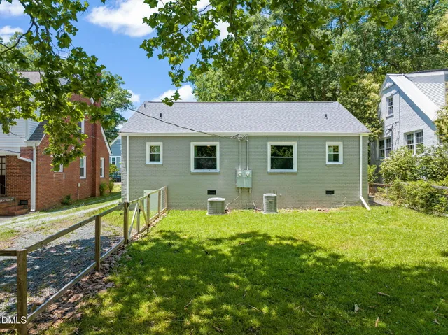 a house view with a garden space