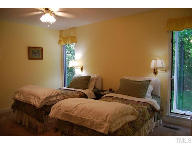 3407 West Cornwallis Road Durham, NC 27705 - Photo 7 of 12 Downstairs bedroom. This wing has the bedroom, bath and utility room. All very accessible.