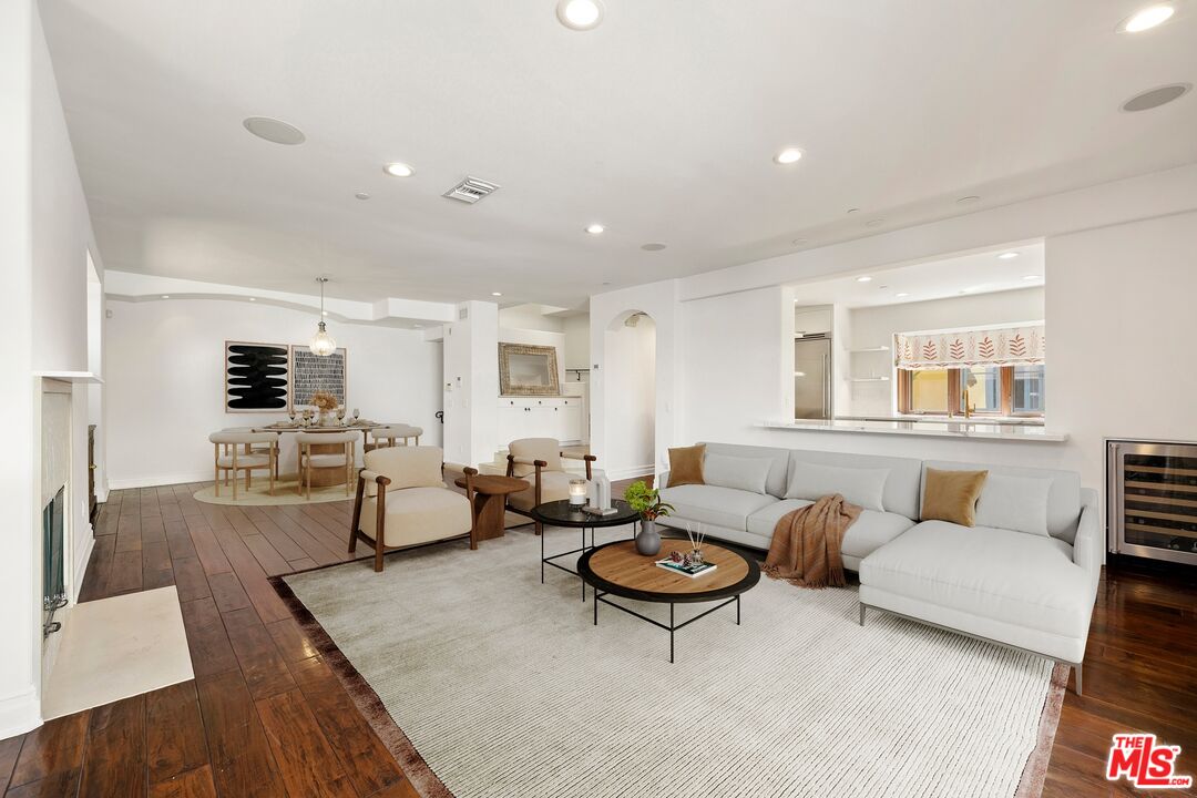 849 14th Street, Unit 8 Santa Monica, CA 90403 - Photo 1 of 19 a living room with furniture and a couch