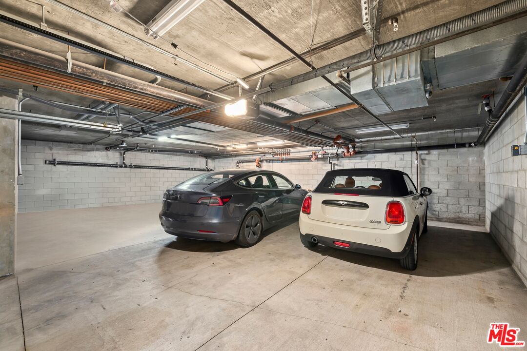 849 14th Street, Unit 8 Santa Monica, CA 90403 - Photo 15 of 19 a car parked in a garage