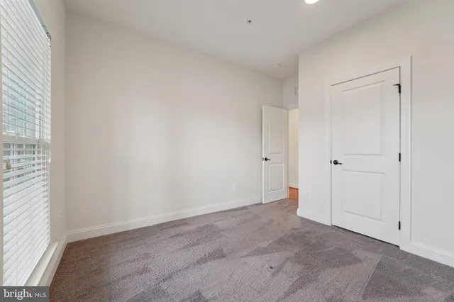 a bathroom with a double vanity sink mirror and double