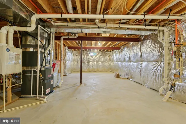 an aerial view of a house with a big yard