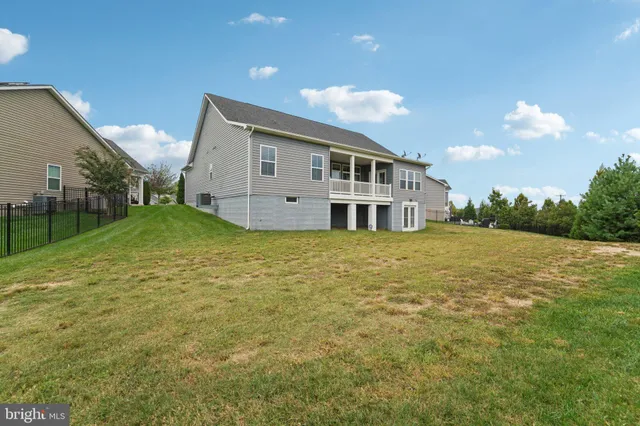 an aerial view of a house with a garden