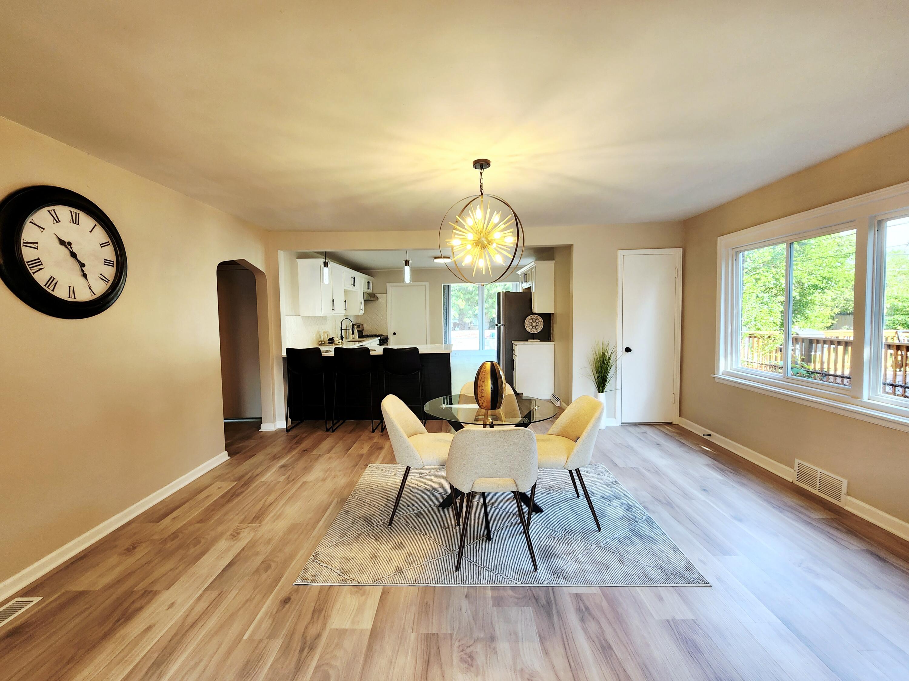 653 West Taft Street Gary, IN 46404 - Photo 4 of 16 a view of a dining room with furniture window and wooden floor