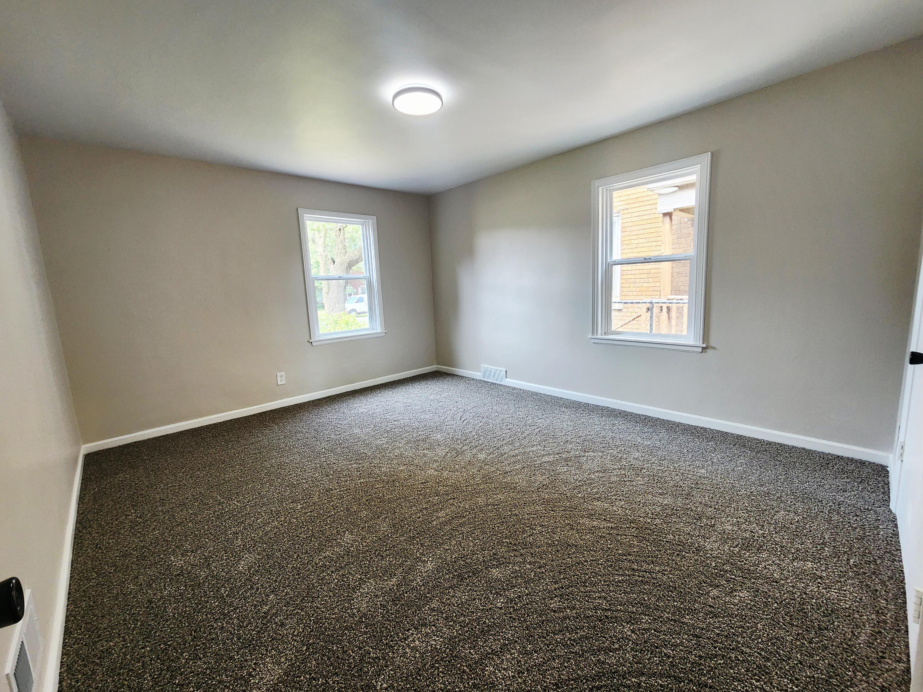 653 West Taft Street Gary, IN 46404 - Photo 10 of 16 an empty room with windows