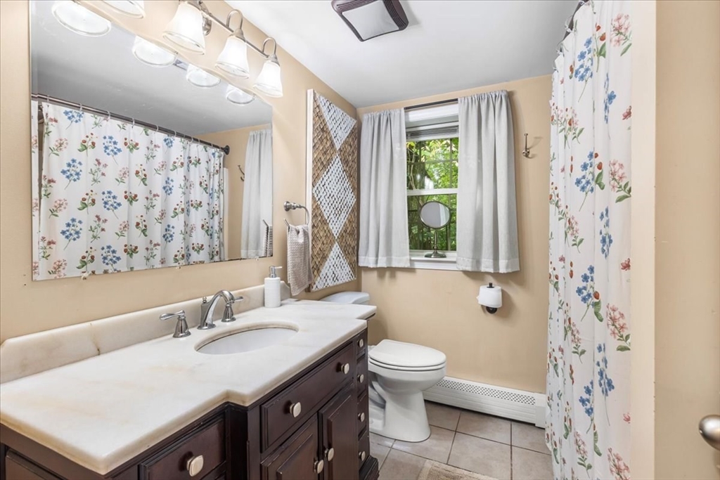 20 Cooks Lane Bellingham, MA 02019 - Photo 13 of 21 a bathroom with a sink toilet and shower