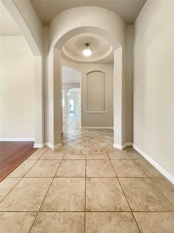 a view of a livingroom with wooden floor