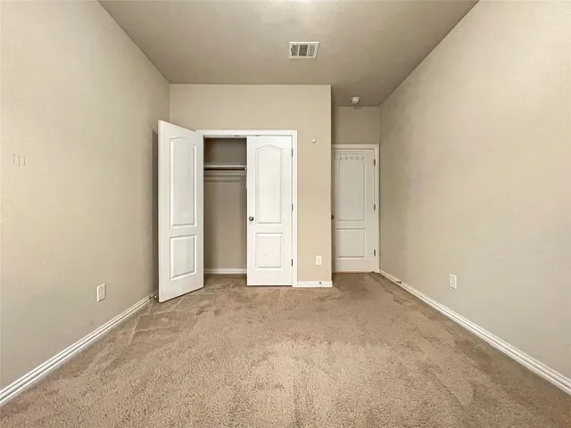 an empty room with closet
