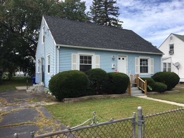 234 Redlands Street Springfield, MA 01104 - Photo 1 of 9 a view of a house with a yard