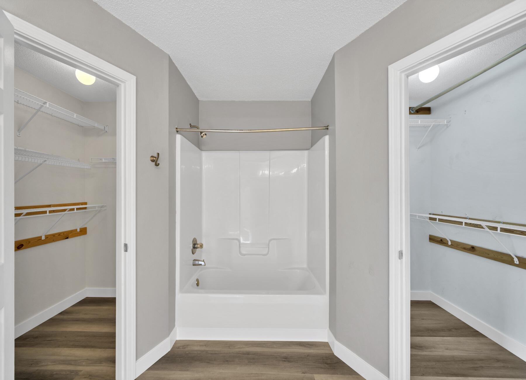 5130 Whitehurst Lane Crestview, FL 32536 - Photo 28 of 49 a view of bathroom with a bathtub and a shower