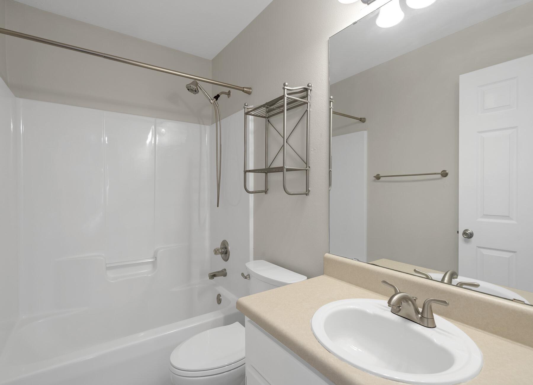 5130 Whitehurst Lane Crestview, FL 32536 - Photo 34 of 49 a bathroom with a sink toilet and shower