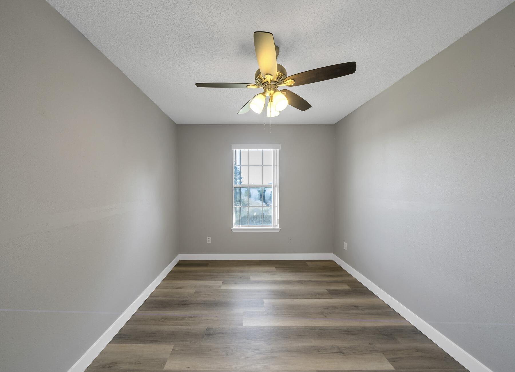 5130 Whitehurst Lane Crestview, FL 32536 - Photo 37 of 49 a view of an empty room and window