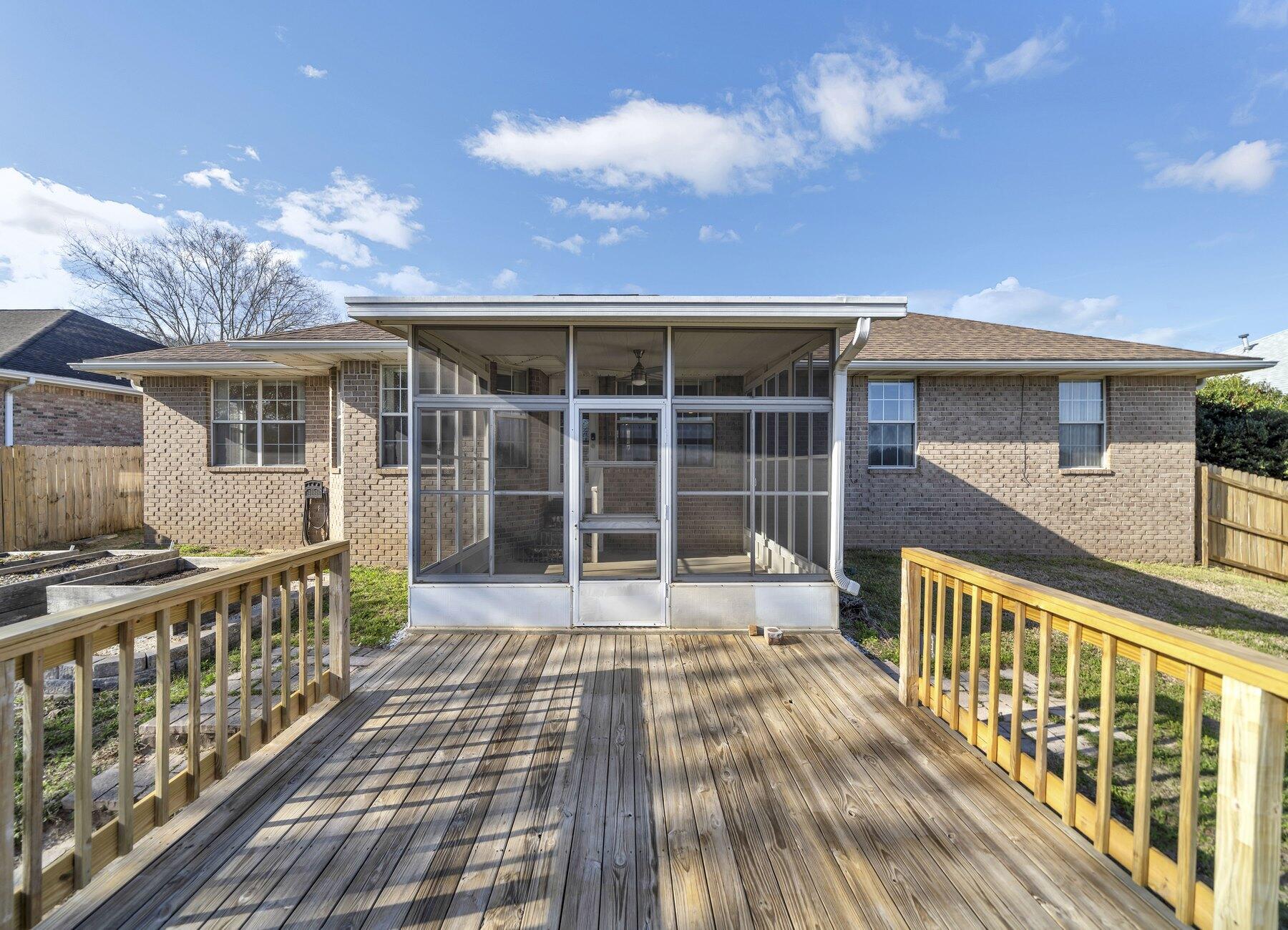 5130 Whitehurst Lane Crestview, FL 32536 - Photo 43 of 49 a view of a house with wooden deck