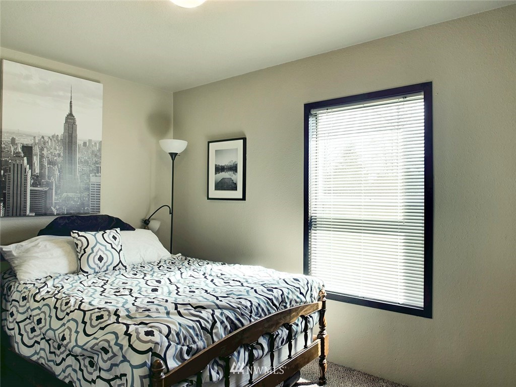 55 Old Goat Lane Sequim, WA 98382 - Photo 19 of 32 a bedroom with a bed and a window