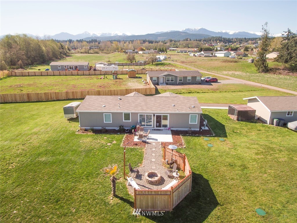 55 Old Goat Lane Sequim, WA 98382 - Photo 22 of 32 a view of a lake with a mountain